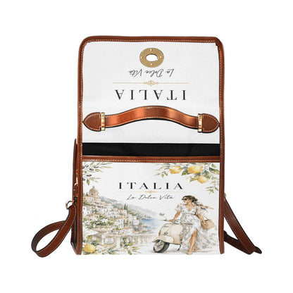 La Dolce Vita Damen-Handtasche – Italian Style mit Zitronen-Motiven, Vespa-Detail und braunen Akzenten.