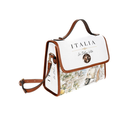 La Dolce Vita Damen-Handtasche - Italian Style mit Zitronen-Motiven, Vespa-Detail und braunen Akzenten.