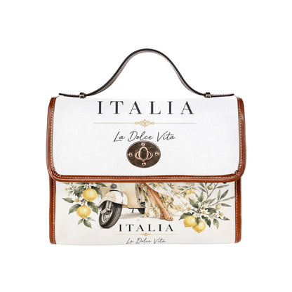 La Dolce Vita Damen-Handtasche – Italienischer Stil, Zitronen-Motiv, Vespa-Detail und braune Akzente.